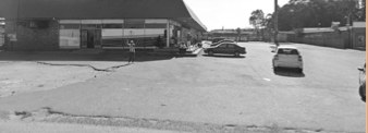 Existing retail building and open parking on the Tasbet Crossing site